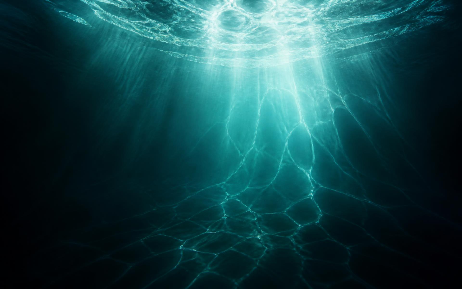 Sunlight breaking through deep ocean water